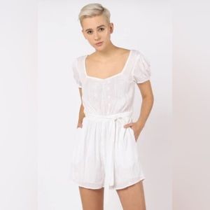 Black Tape_ Women’s Puffed Sleeve Eyelet Romper in White Sz XS